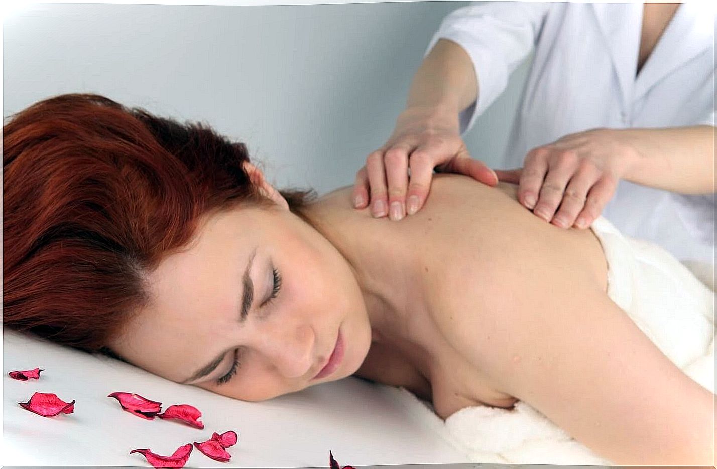 woman receiving massage for depression