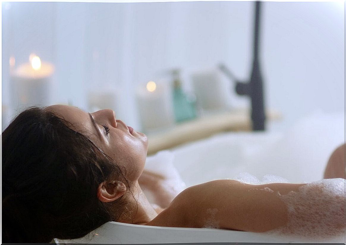 Woman taking a relaxing bath