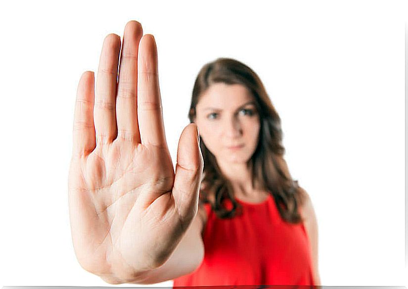 Woman with hand setting limits