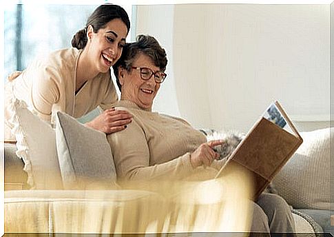 Woman reflecting happiness while accompanying an elderly person