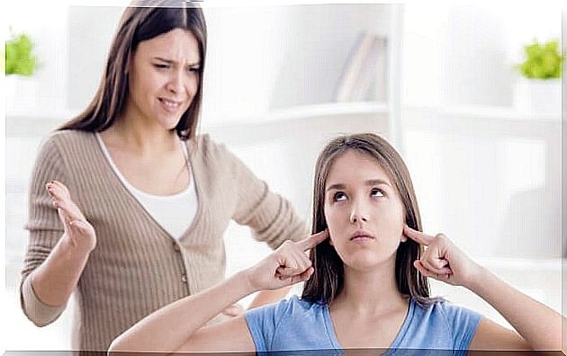 Teenager showing reactance and not listening to his mother
