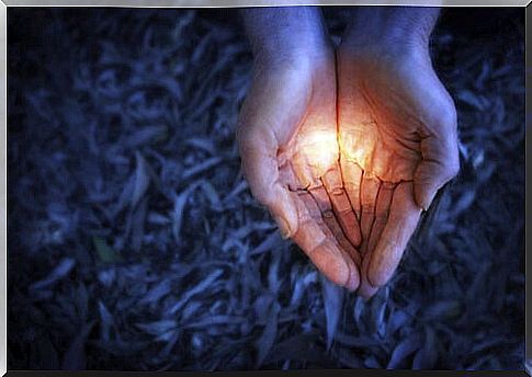 Hand with a light representing hope