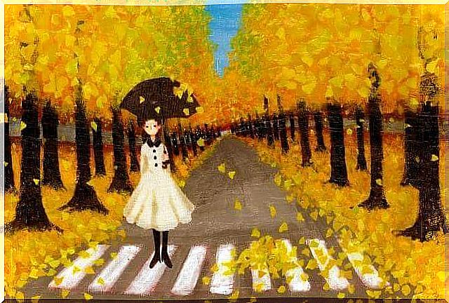 Girl on zebra crossing with yellow trees