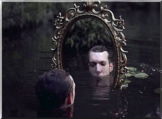 man before mirror